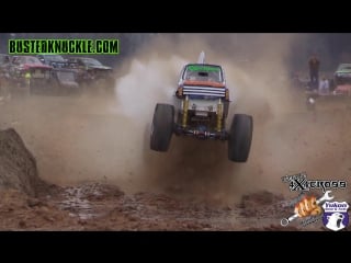 Mega mud trucks gets massive air off the hill n hole jump at twitty's mud bog during the 2014 4×4 cross throttle king finale