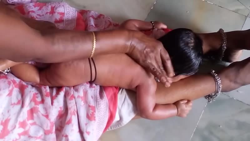 Baby enjoys south india traditional new born baby massage