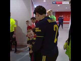 Special moment before the game as captain hector bellerin helps out his @arsenal mascot in the cold