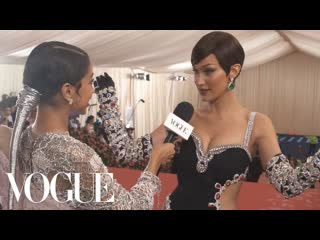 Bella hadid on her jewel encrusted met gala dress | met gala 2019 with liza koshy | vogue [rus sub]