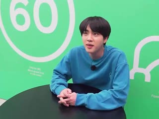 Seokjin got so excited about going home that he bumped his head on the wall someone put a helmet on him