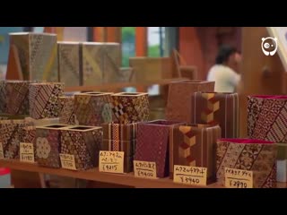 The japanese yosegi art of gluing colored wood and cutting it into thin sheets for decoration