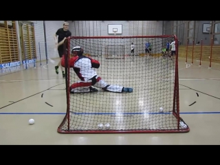 Floorball goalie saves training