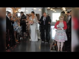 Paralysed dad walks daughter down aisle on wedding day in derby