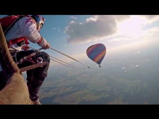 Skydivers play on the ultimate mega swing