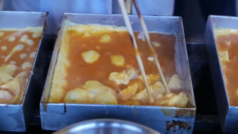 Японская улица еда яйцо омлет тамагояки