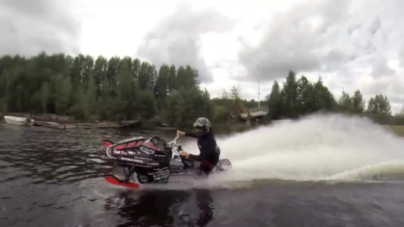 Snowmobile wheelies on water