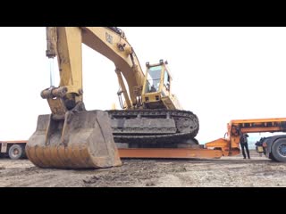 Loading and transporting cat 375 and cat 245 excavators heavy transports