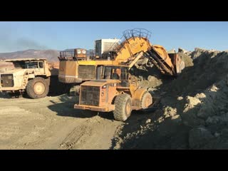 Liebherr 994 shovel excavator loading dumpers and operator view