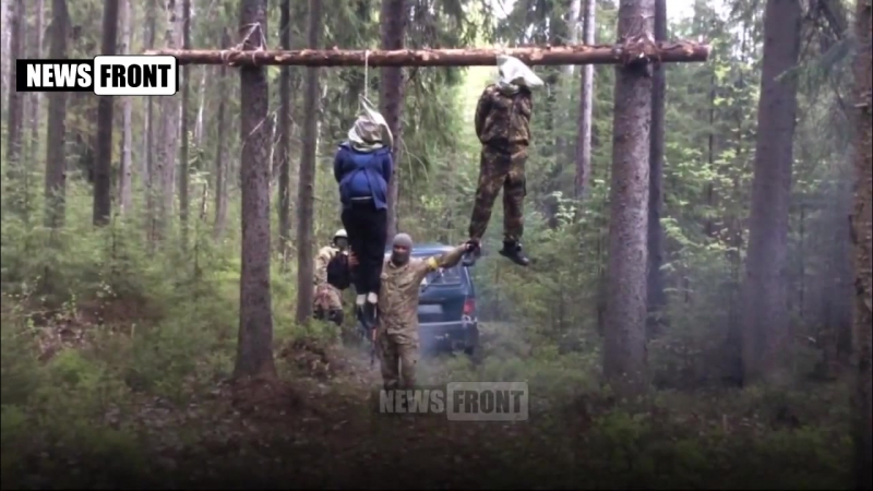 [18+] казнь ополченца и его беременной жены, предположительно батальоном «донбасс»