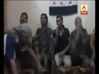 Moment syrian rebel blows himself and comrades up by using mobile phone bomb detonator to