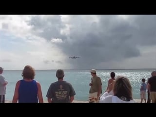 Behind an airplane takeoff st maarten airport maho beach footage at princess juliana airport