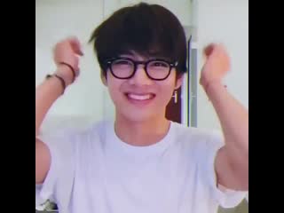 Taehyung in glasses fixing his hair then gave the cutest smile and giggle