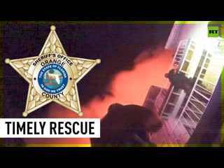 Officer rescues baby girl from burning building