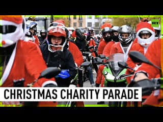 Holiday charity madrid bikers ride city streets to raise funds