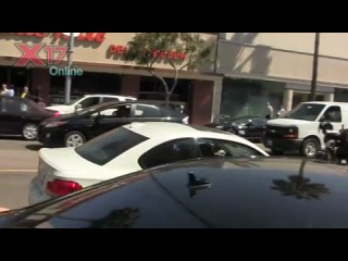 Kourtney kardashian and family swarmed by photogs at nate 'n al