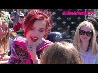 Bella thorne flashes her new diamond rolex while greeting fans at extra in universal studios