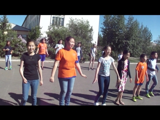 Tuvan state university students are showing the camp participants how to do morning exercises (june 9, 2016)