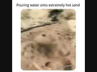 Pouring water onto extremly hot sand