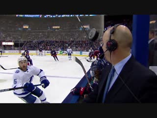 Hockey gods on pierre mcguires side after puck flies between the benches