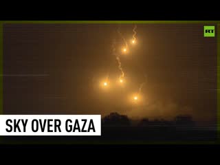 Flares lit up over gaza as israel deepens military assault