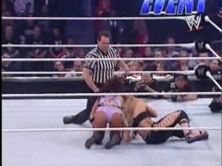 Trish stratus and mickie james vs victoria and candice michelle