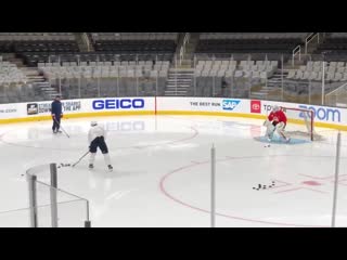 Nicklas backstrom is the first skater on the ice for practice, working with the goalies