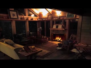 Cozy cabin in winter storm cabin fireplace burning in blizzard snow storm for sleep, relax