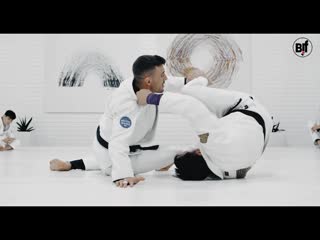 Nick bohli 2 defending the de la riva hips on the mat from on top