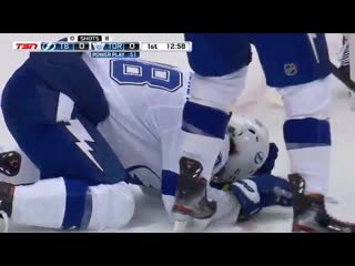 Sergachev is down after taking a puck off his helmet