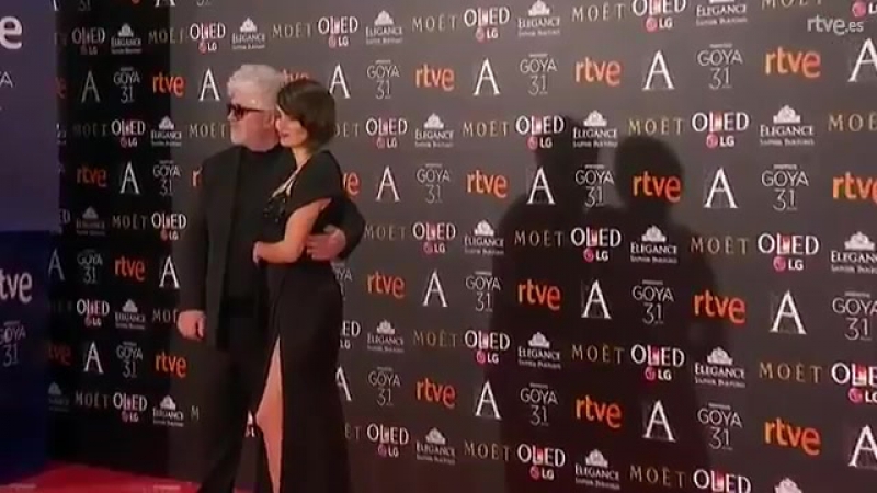 Penélope and pedro almodovar pose together for photographers at the goya 2017 in madrid