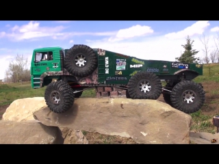 Rc adventures triple axle green semi hits the rock pile and conquers