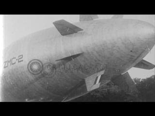 Us navy zmc 2 airship moves out from hangar and takes off from airfield for first hd stock footage