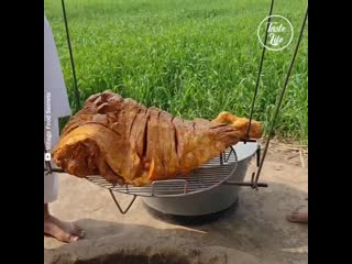 Taste life cooking huge beef thigh in tandoor oven facebook mp4