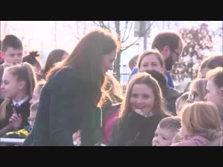 A young girl was spotted stroking kates hair while she greeted crowds on her visit to a community centre in dundee kate lau