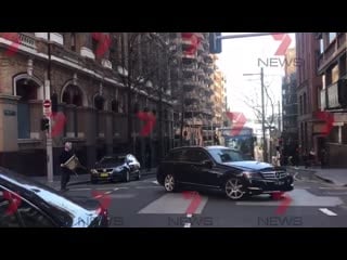 Graphic video footage shows man with machete being restrained by civilians after stabbing multiple people sydney
