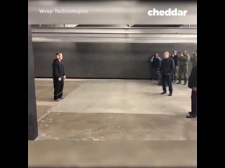 Non lethal handheld restraining device