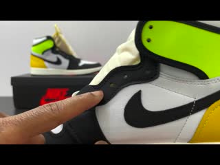 Real vs fake air jordan 1 volt gold stockx plus blacklight test