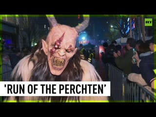 Folklore figure parade takes place in vienna