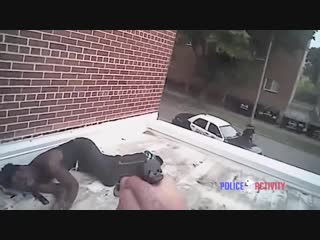 Bodycam captures rooftop shooting of man by milwaukee officers (warning graphic content)