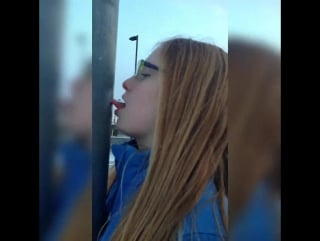 Girl gets tongue stuck on frozen pole