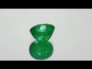 3 64 carat splendid fiery green oval cut emerald from zambia