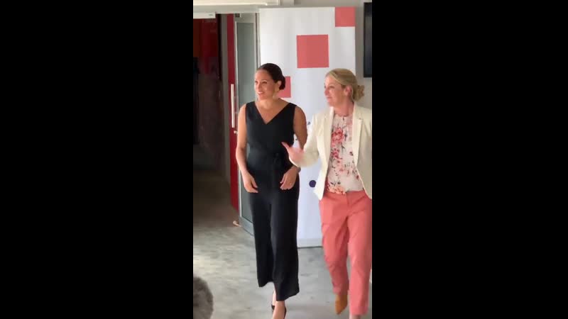 Duchess meghan is being escorted by @ukinsouthafrica tech hub director shirley gilbey, who