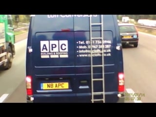 Shows road rage van driver stop in front of lorry in the middle of busy m62 motorway i