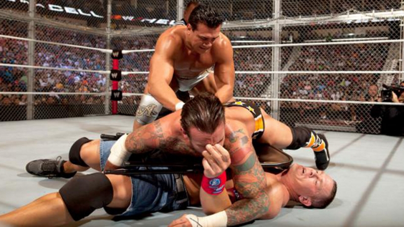 (wwe mania) hell in a cell 2011 john cena vs cm punk vs alberto del rio wwe championship ( hell in a cell match)