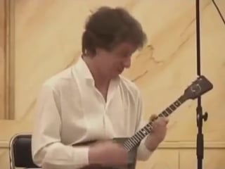 Russian virtuoso alexey arkhipovsky plays paganini on balalaika