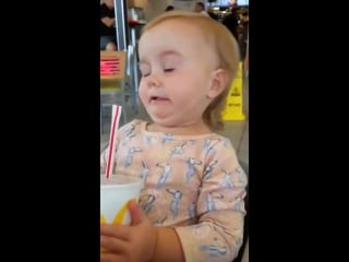 Evies first sip of coke