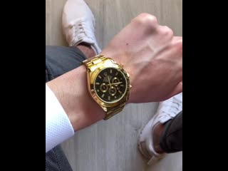 Rolex daytona gold black