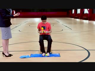 Fastest time to solve 3 rubiks cubes with hands and feet guinness world records day 2018