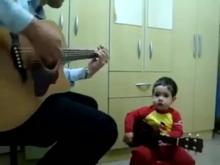 2 year old boy and his dad perform the beatles dont let me down